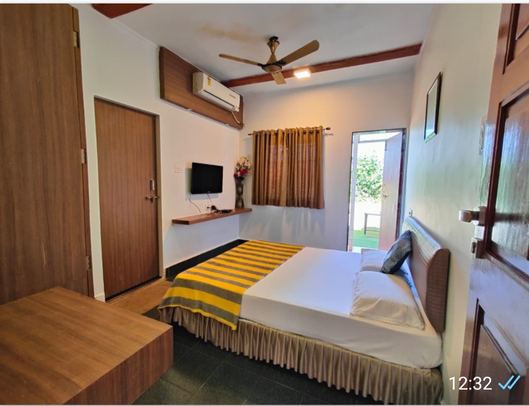 Royal Baga Residency | STANDARD ROOM with BALCONY