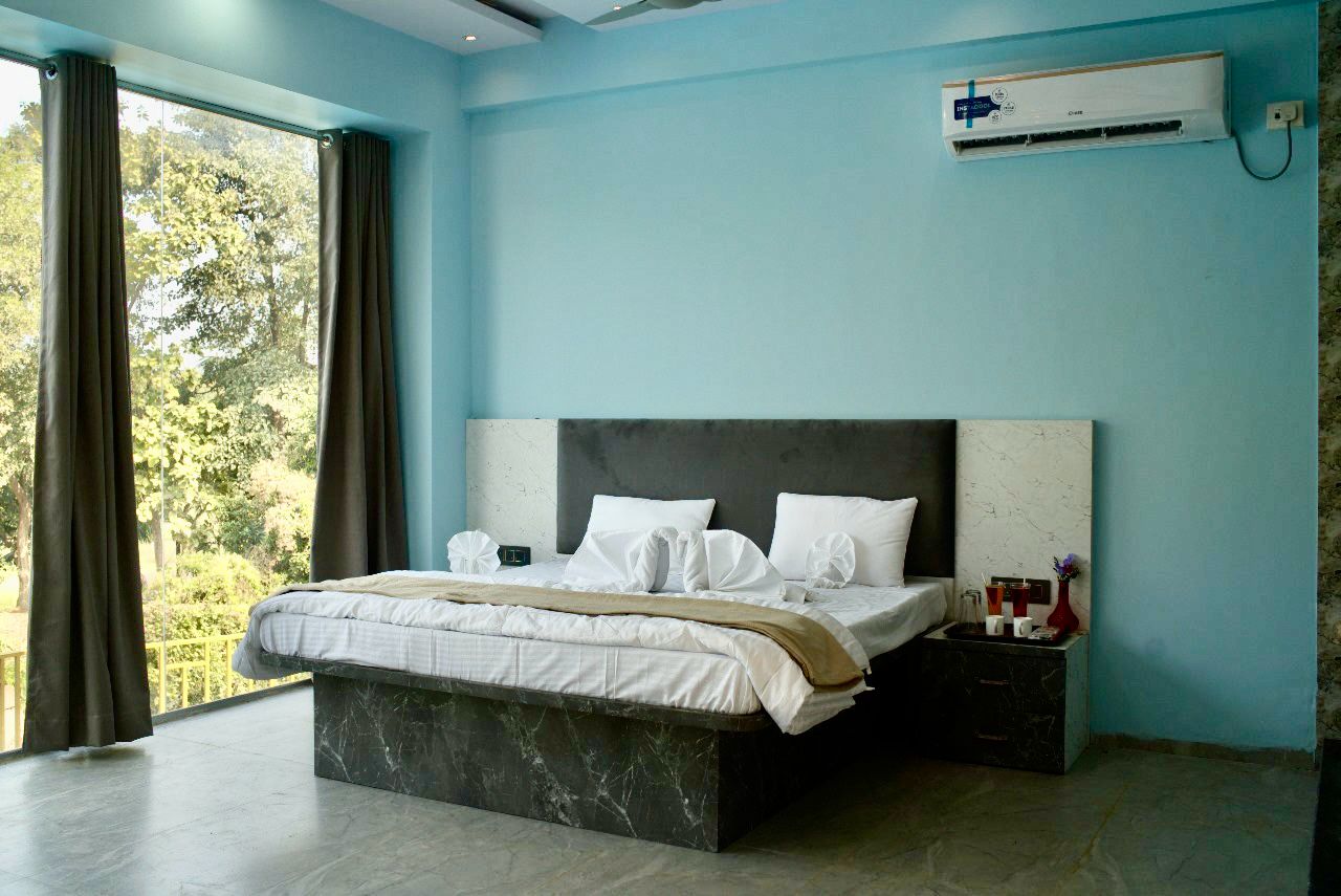 1 x GroupBooking Min 6-9 sharing - AC Room